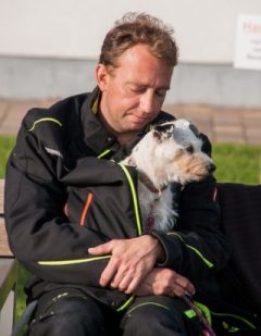 Man waiting with his dog