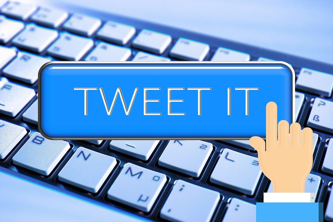 Tweet It button overlaid on a keyboard
